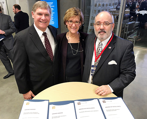 Shown receiving the awards for OPA were MSU’s Checky Herrington, OPA creative director and marketing research analyst; Harriet V. Laird, OPA associate director; and Sid Salter, OPA director and MSU’s chief communications officer
