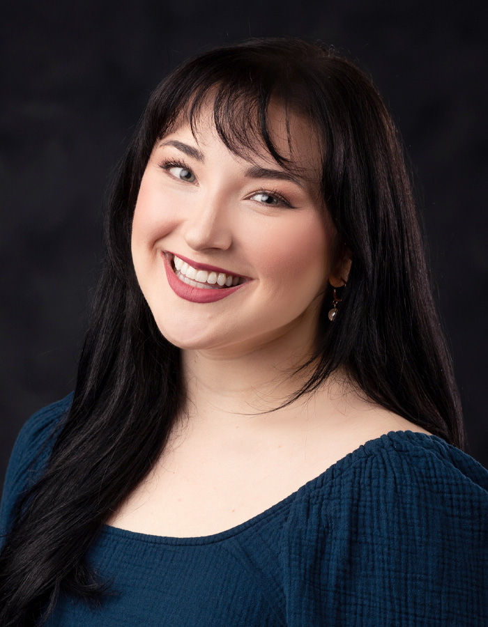 Formal studio headshot portrait of Grace Cockrell