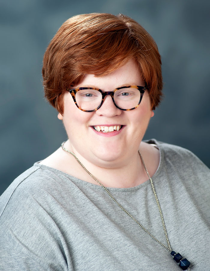 Formal studio headshot portrait of Hayley Gilmore